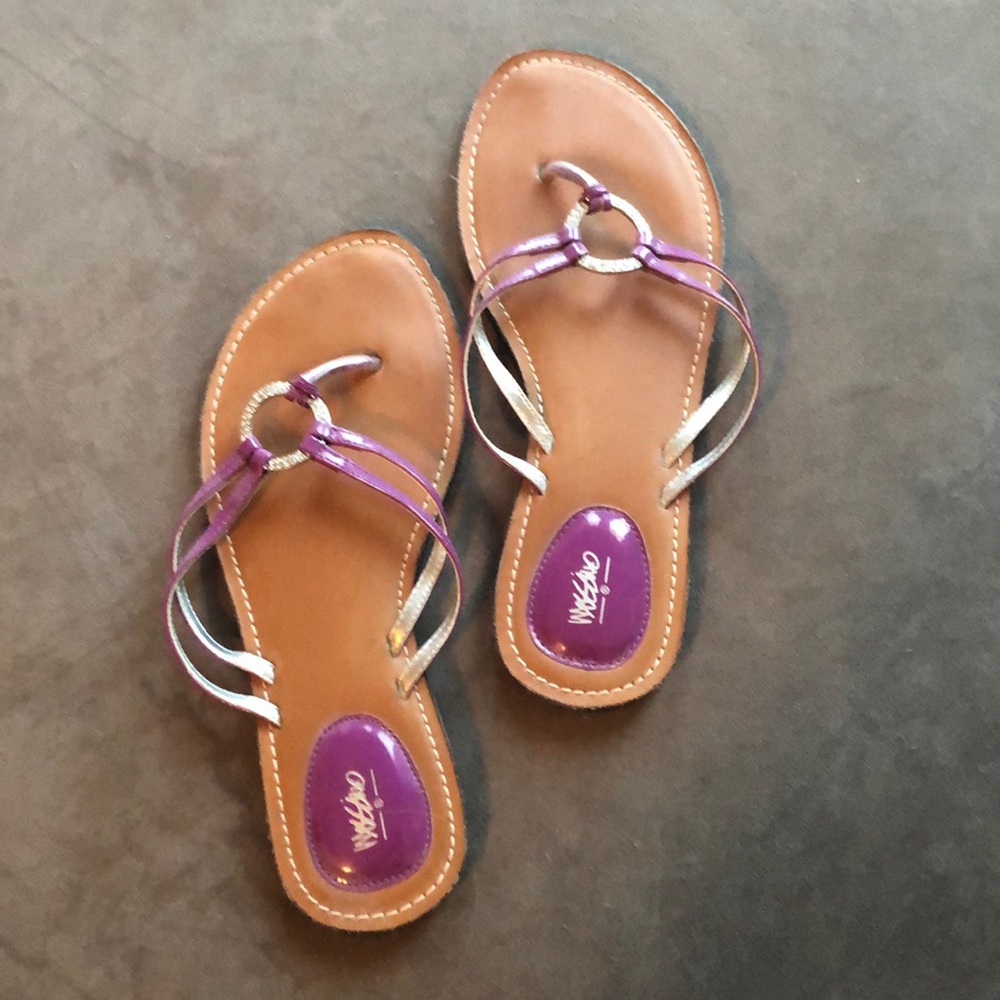 Purple leather flip flops